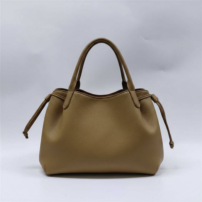 Sac brun vue face fond blanc