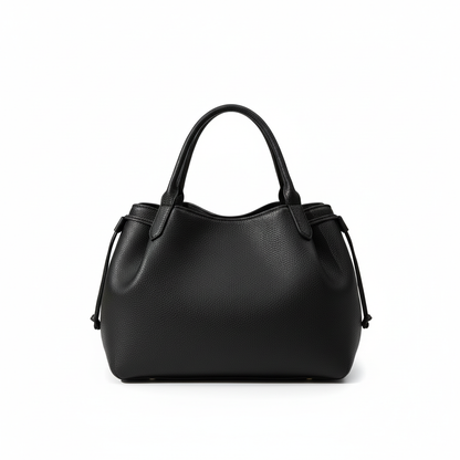 Sac noir fond blanc éclairage naturel