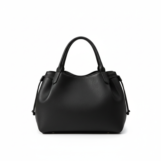 Sac noir fond blanc éclairage naturel